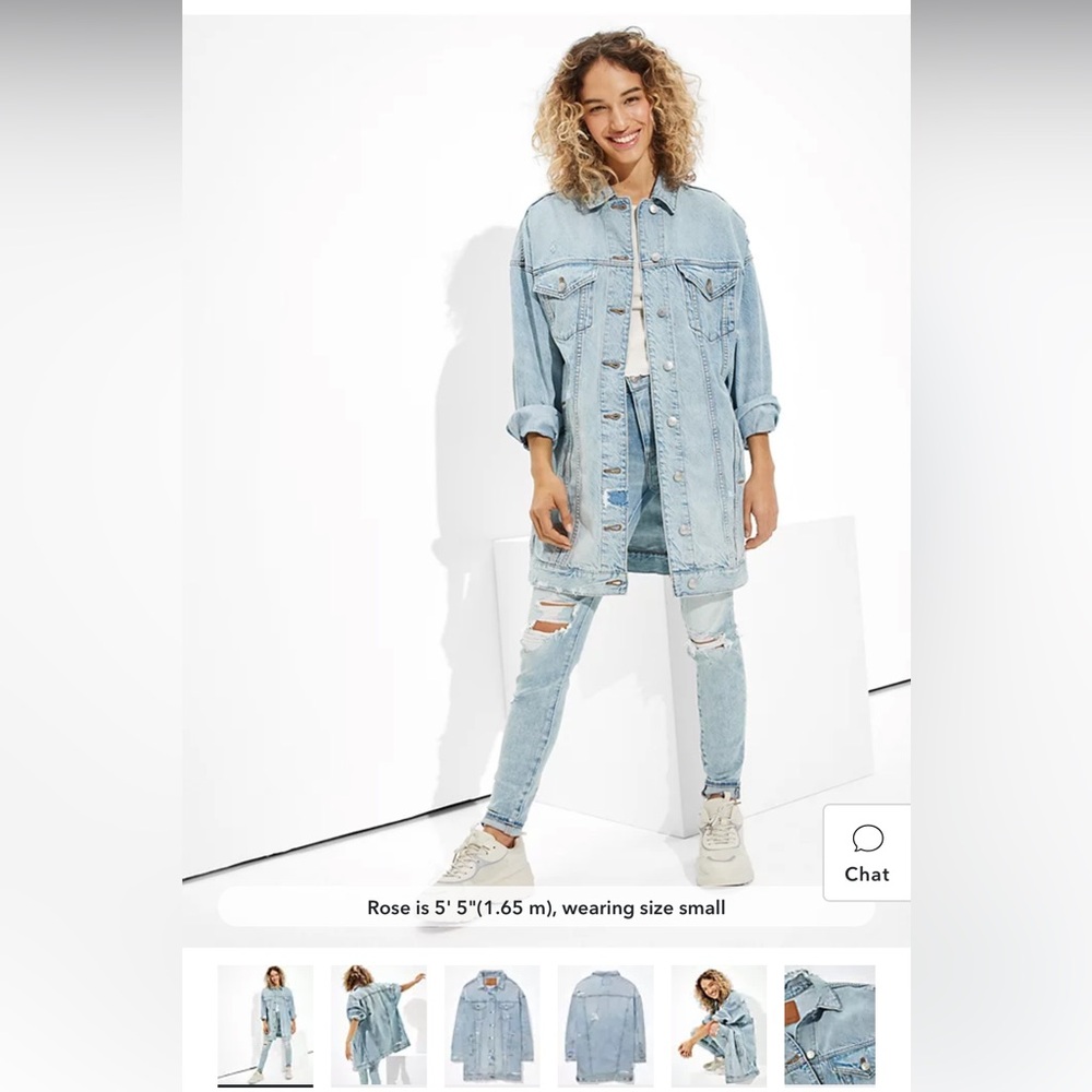 Oversized, distressed blue jean jacket.
